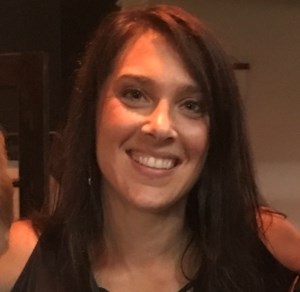 Kelly Miller smiles